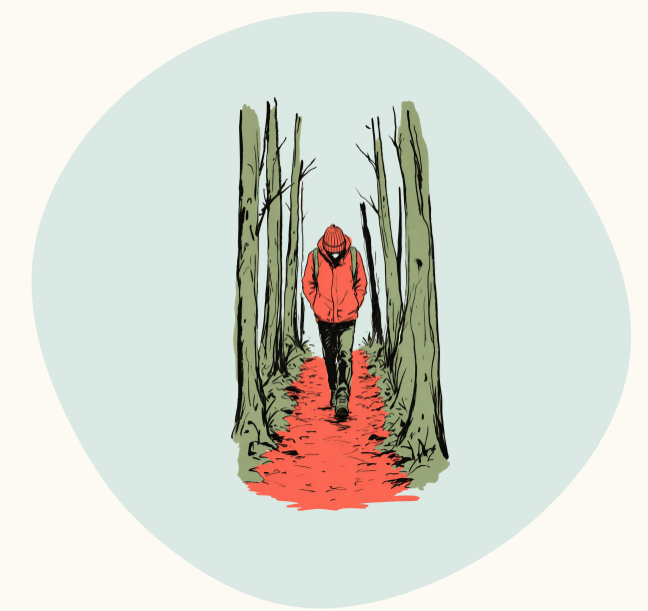 Person in a red jacket walking alone down a leaf-covered forest path.