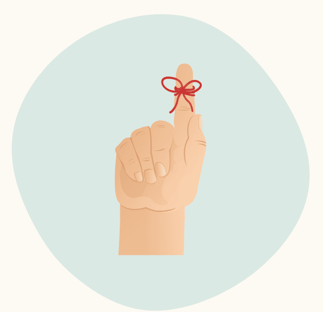 Illustration of a hand with a red string tied around the index finger as a reminder.