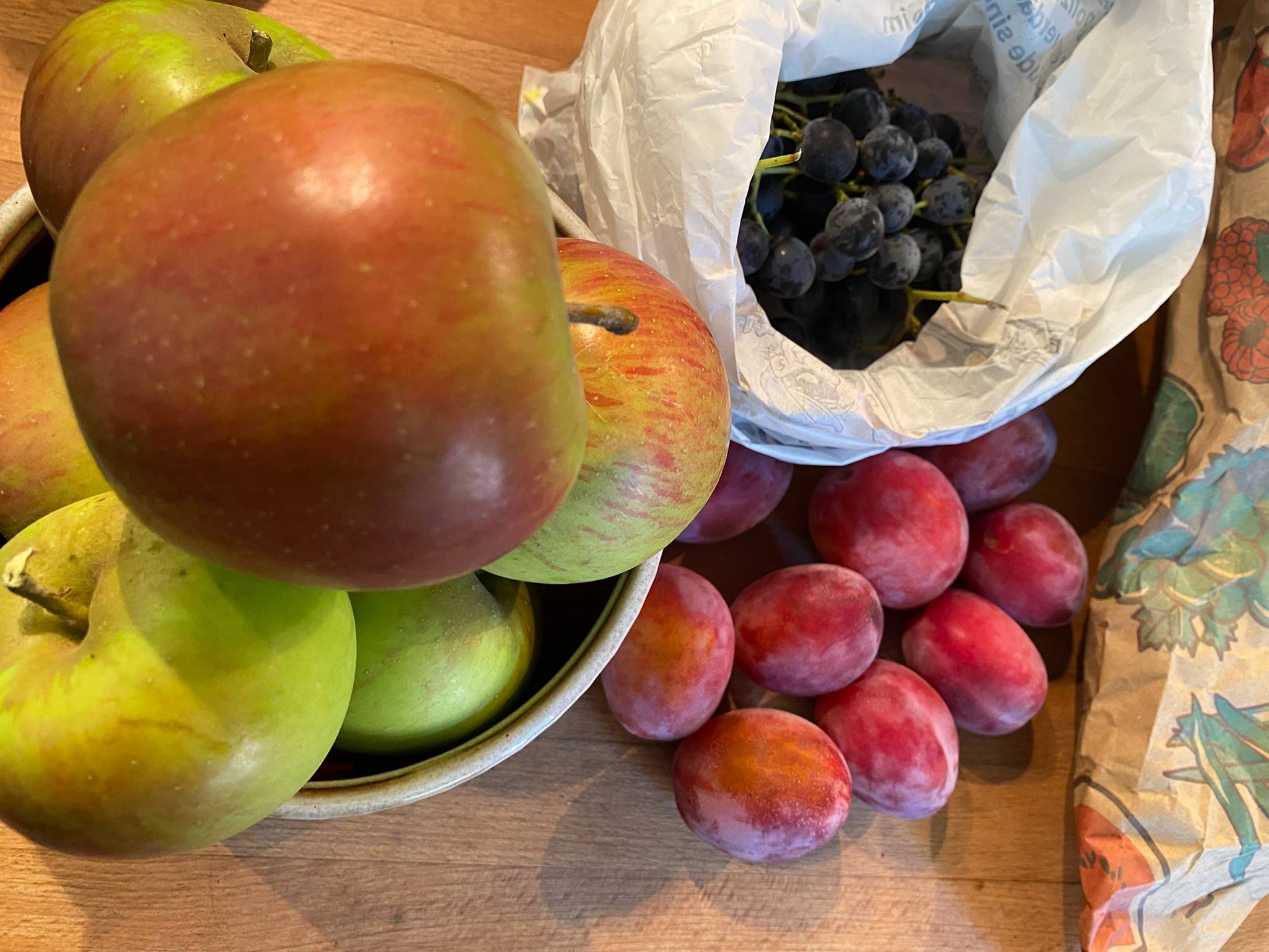 Fresh local apples, grapes, plums