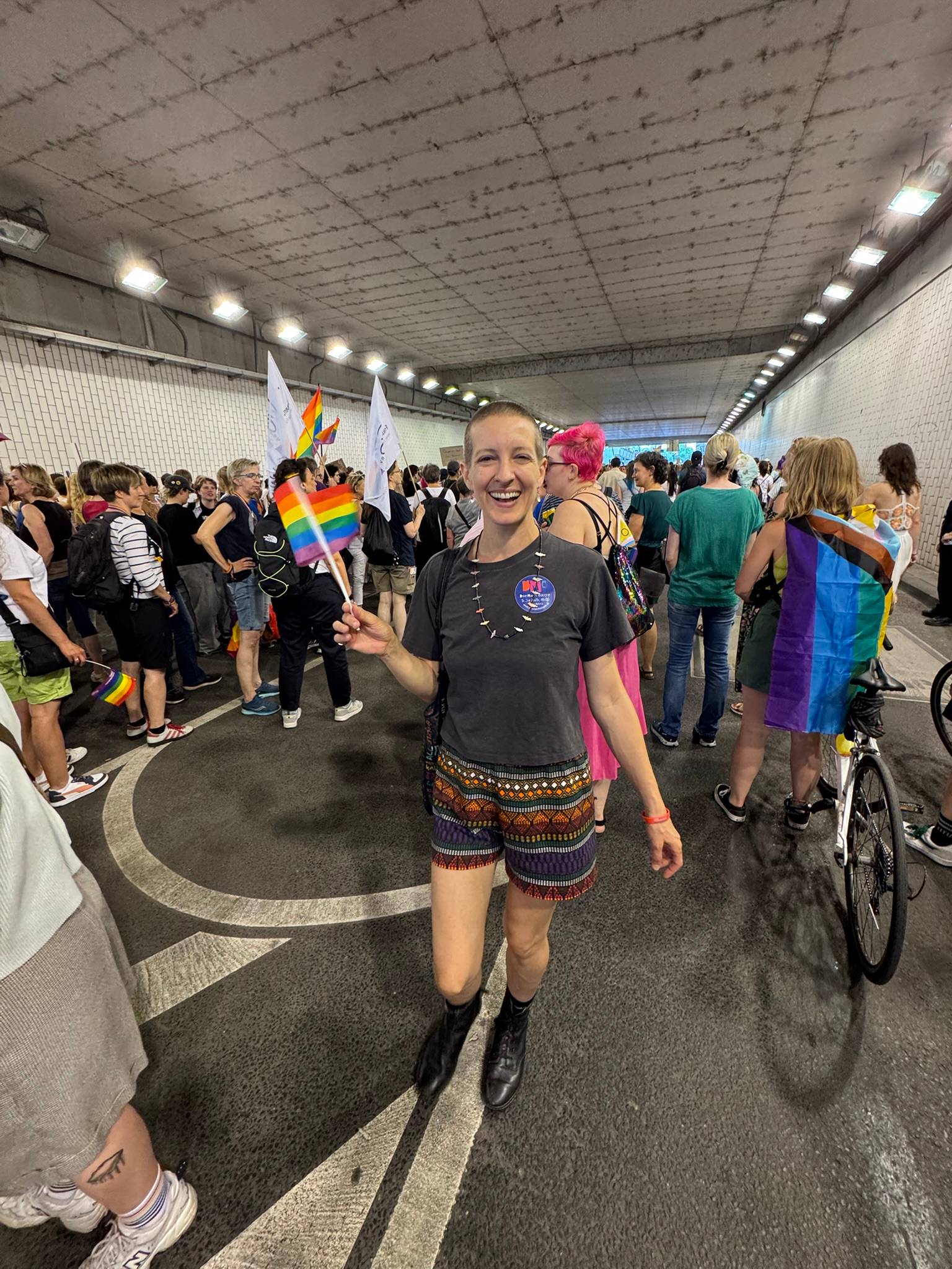 Blythe dancing to drums under the Dom at Dyke March Cologne 2025