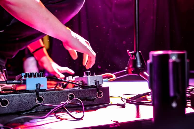 A dj mixing music in front of a microphone