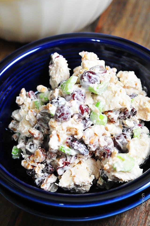 photograph of chicken salad in a blue bowl.