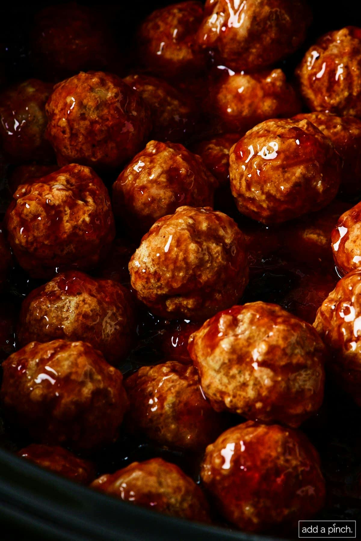 Grape Jelly Meatballs in a slow cooker.