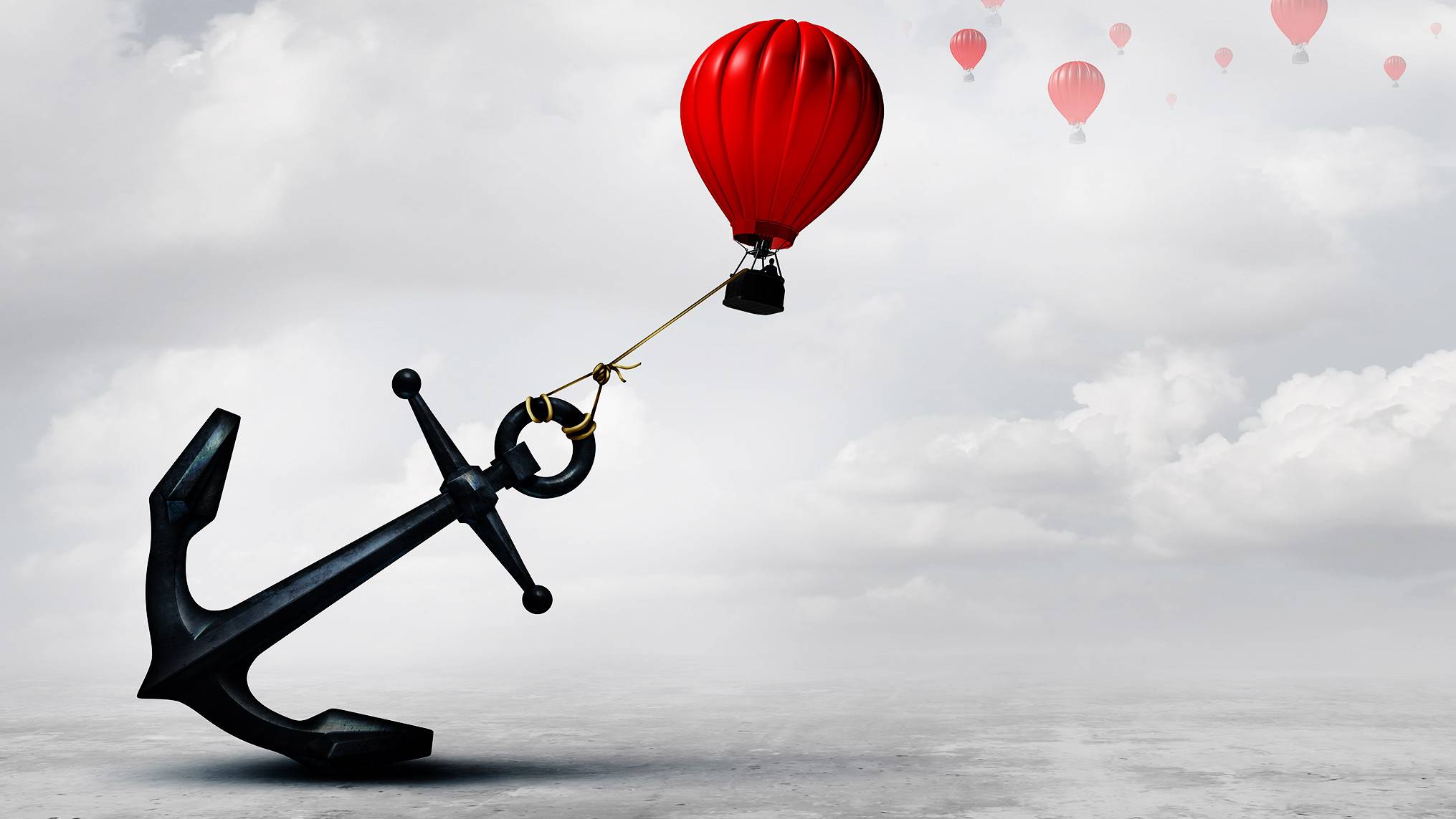 A heavy metal anchor tied to a single red balloon floating against a pale sky, with a cluster of red balloons drifting further in the distance — a visual metaphor for how one emotional tone anchors an entire room before the conversation begins.