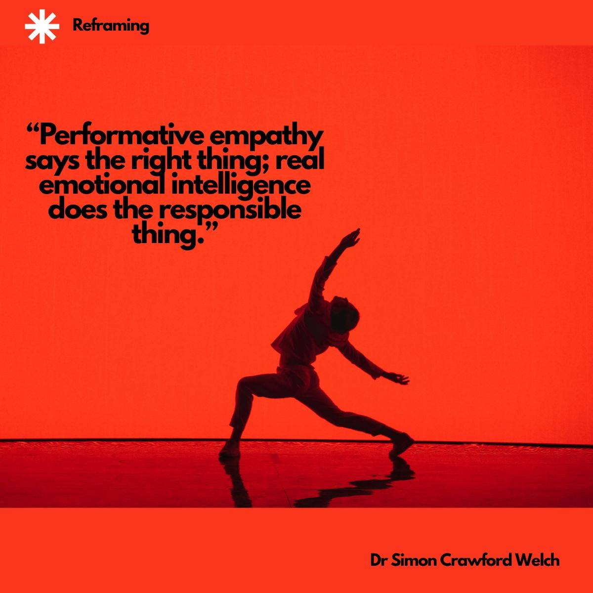 Visual description: A dancer in loose clothing appears in dark silhouette against a saturated red backdrop, body extended in a deep lunge with one arm reaching upward and the other sweeping down, reflected faintly in the glossy floor below. A white asteri