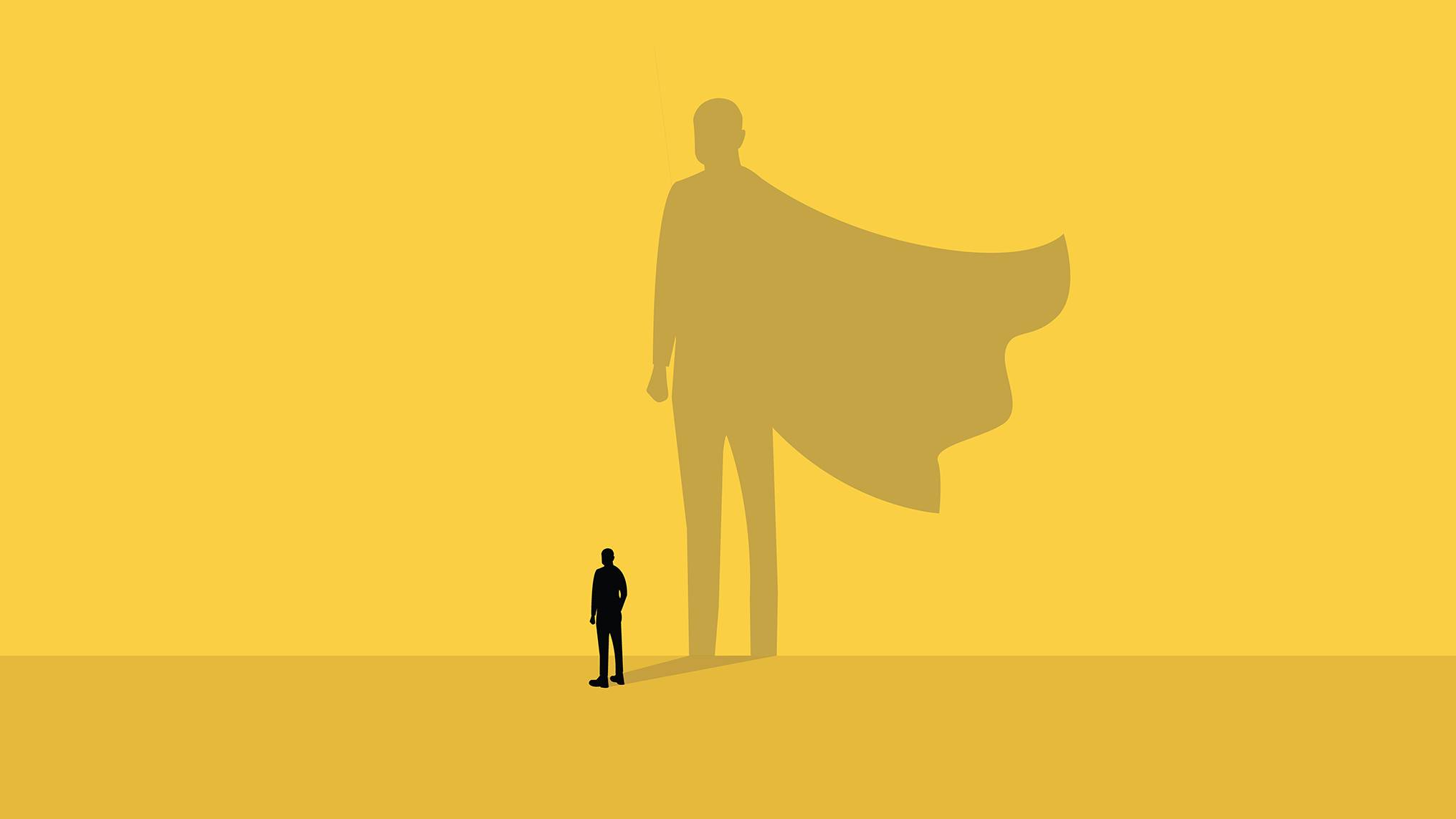 A small, grounded black silhouette of a person standing beside a dramatically oversized caped superhero shadow cast behind them on a golden-yellow background — a visual metaphor for quiet authority, representing the idea that real leadership influence is far larger than the volume or force a leader outwardly projects.