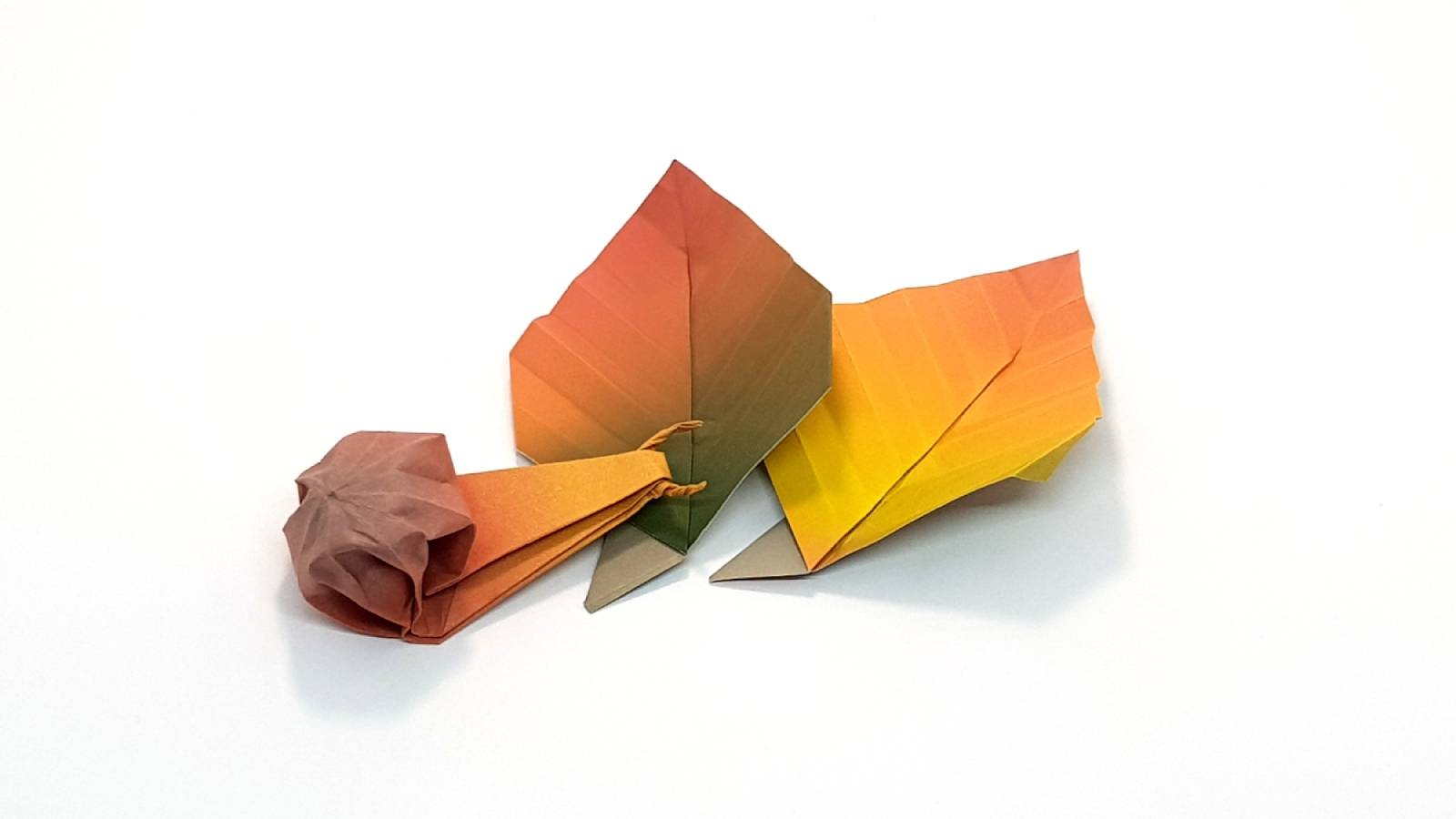 origami snail and leaves