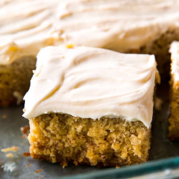 picture of a slice of banana cake with cream cheese frosting