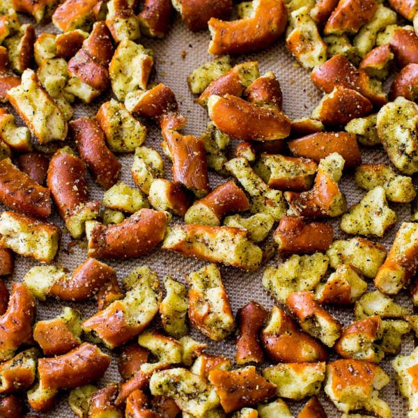 seasoned hard pretzels with on a baking sheet