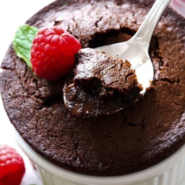 Spoonful of chocolate fudge cake in a ramekin