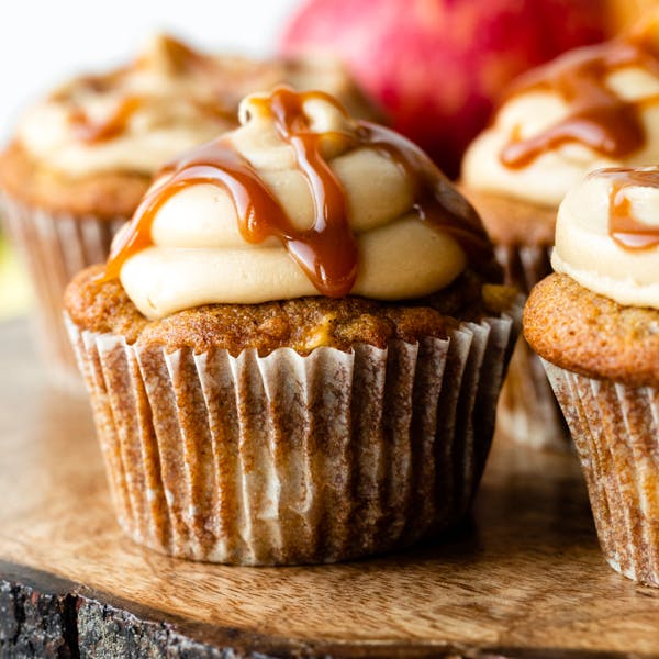 picture of an apple cupcakes with salted caramel frosting and caramel sauce