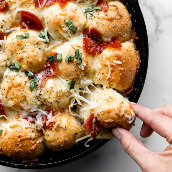 picture of pizza pull apart rolls in a skillet