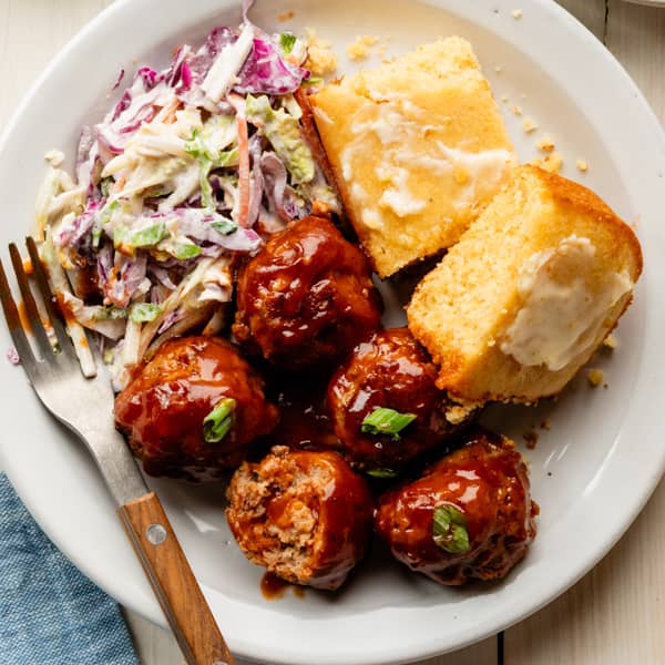 bbq meatballs with coleslaw and cornbread