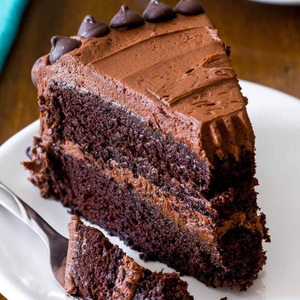 picture of a slice of triple chocolate cake