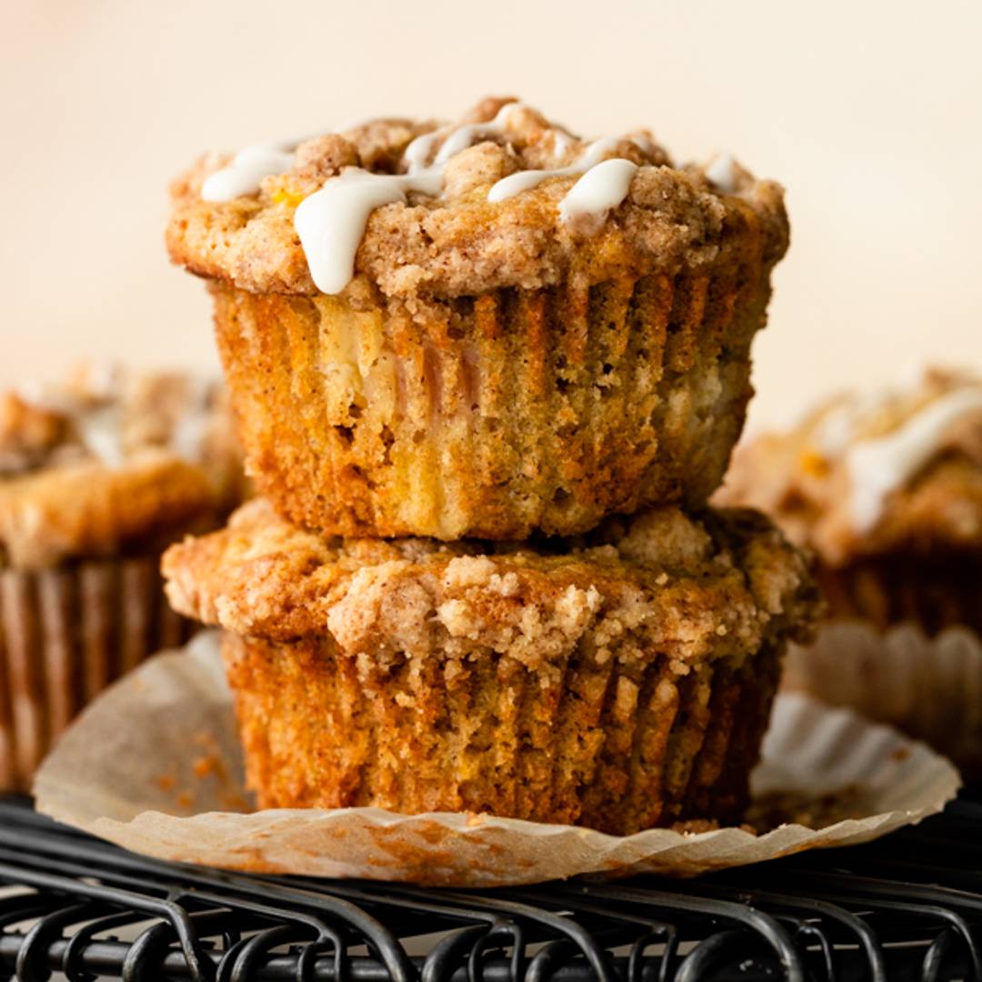 picture of two stacked peach muffins