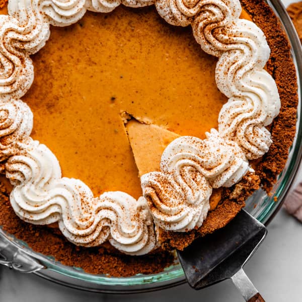 pumpkin cheesecake pie with whipped cream