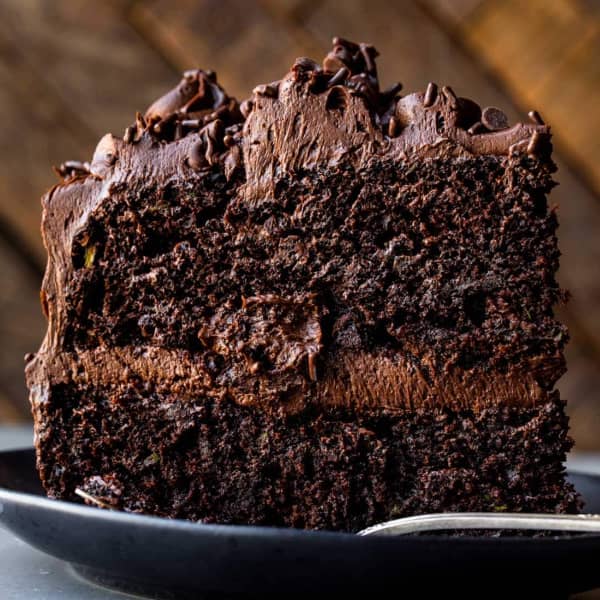 slice of chocolate zucchini cake with chocolate frosting
