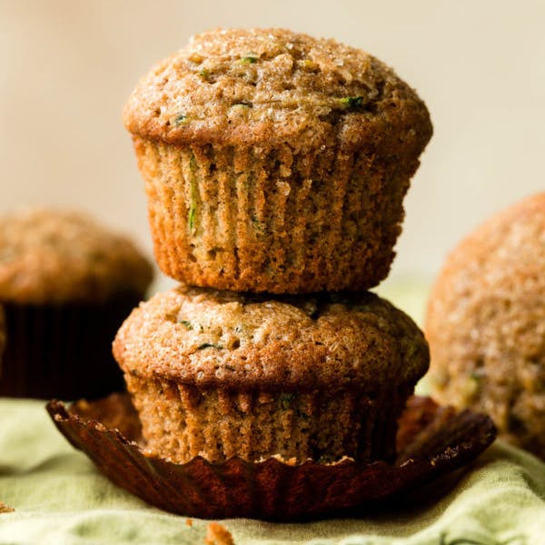 picture of 2 zucchini muffins, stacked