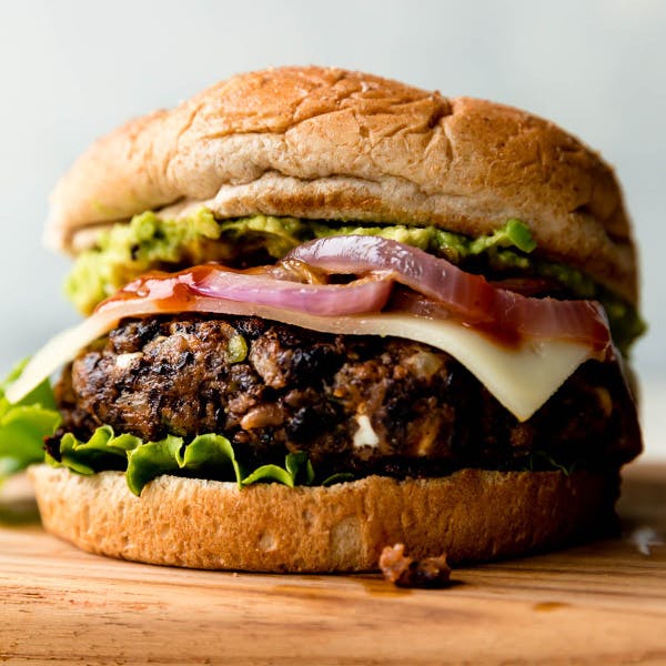 picture of a black bean burger with toppings