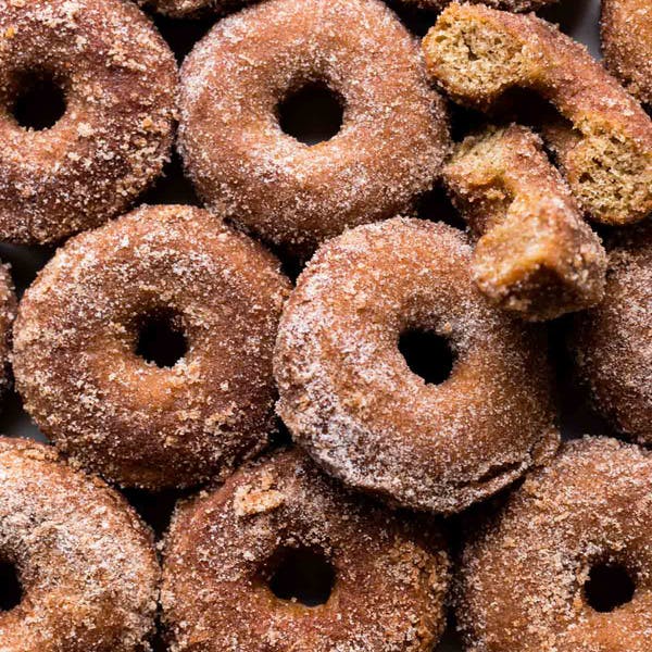 apple cider donuts with cinnamon sugar coating