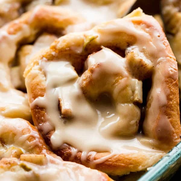 close up apple cinnamon roll with icing