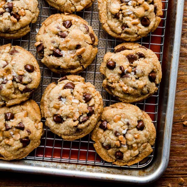 brown butter toffee chocolate chip cookies on a baking sheet