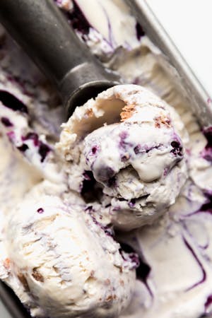 blueberry ice cream with ice cream scoop