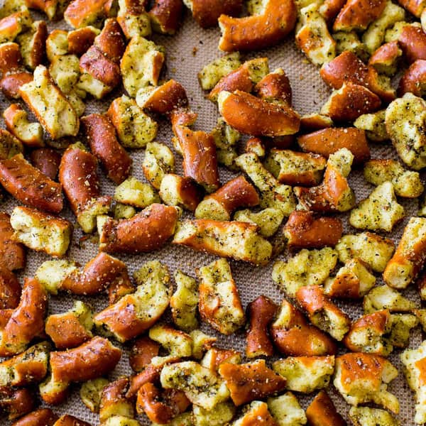Seasoned pretzels on a baking sheet