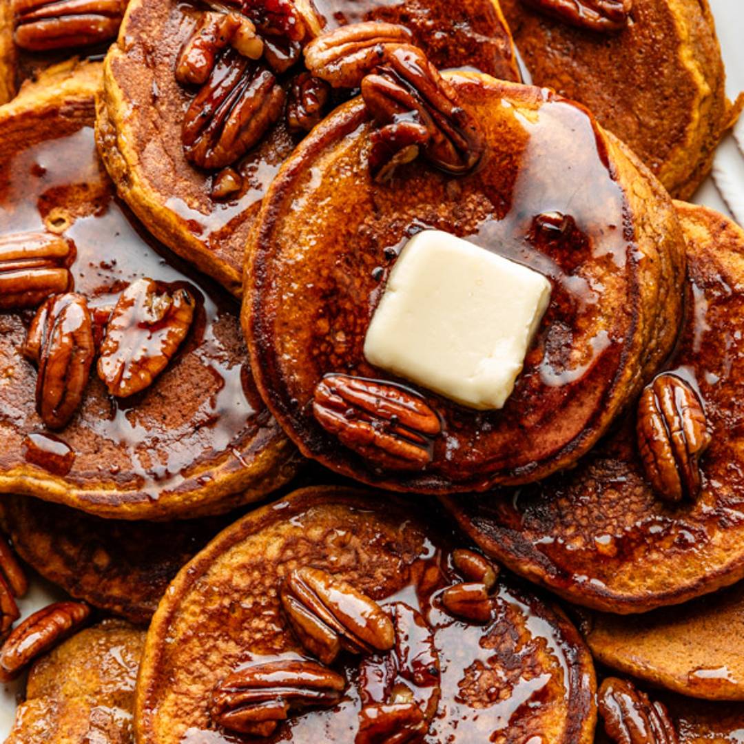 pumpkin pancakes with pecans on top
