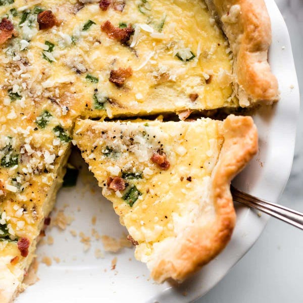 sliced quiche in a pie dish