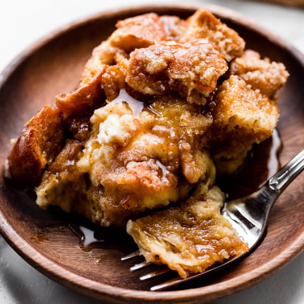 picture of a piece of baked french toast casserole on a plate with a fork