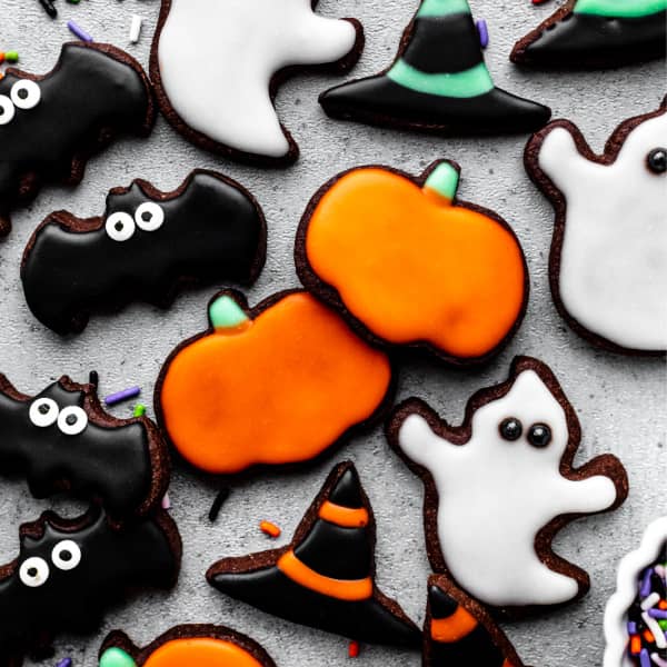 chocolate cut-out halloween cookies, decorated in black, white, orange and green