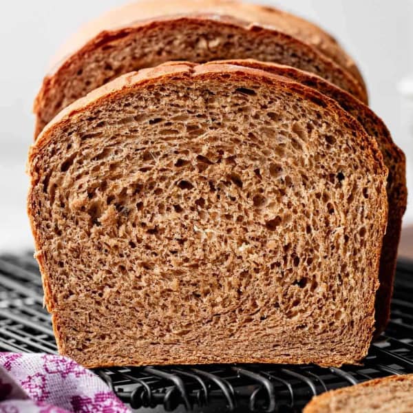 side view of sliced whole wheat bread loaf