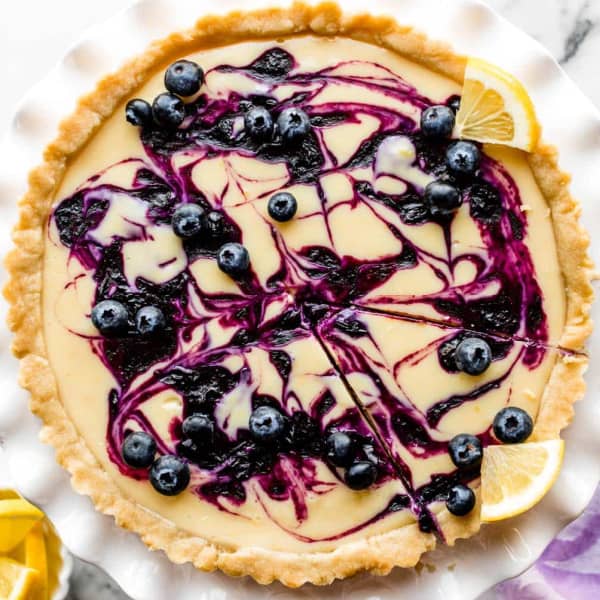 lemon tart swirled with blueberry sauce