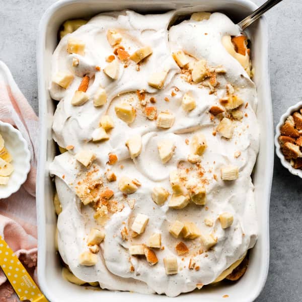 picture of caramelized banana pudding with cinnamon whipped cream topping