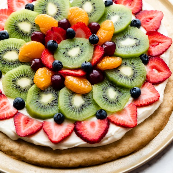 Photo of fruit pizza decorated with fresh fruit