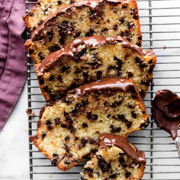 picture of chocolate chip loaf cake sliced on cooling rack
