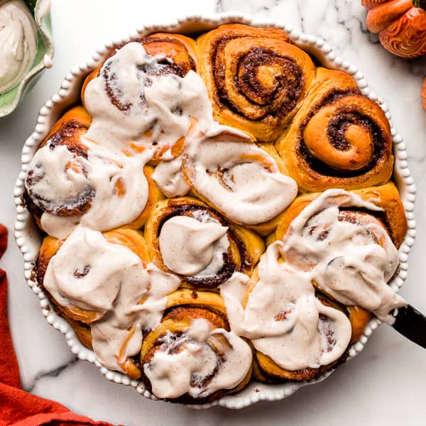 pumpkin cinnamon rolls with icing