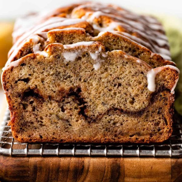 sliced banana bread with cinnamon swirl running through the middle