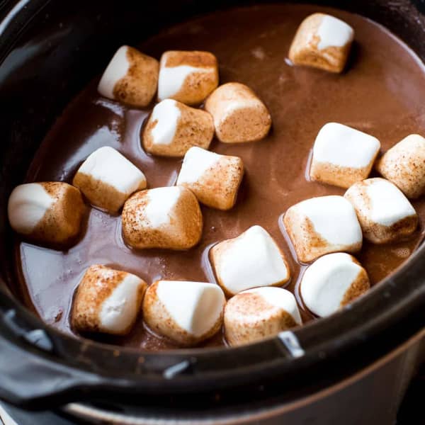 hot cocoa in a slow cooker with jumbo marshmallows