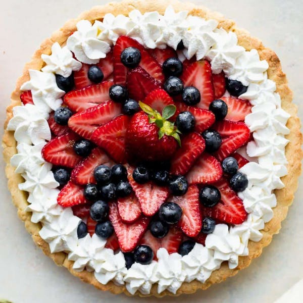 berry fruit tart with whipped cream