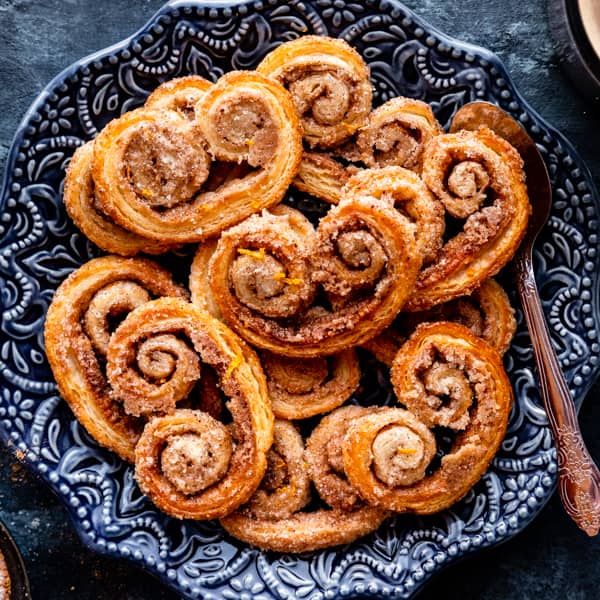 cinnamon spice palmiers on blue plate