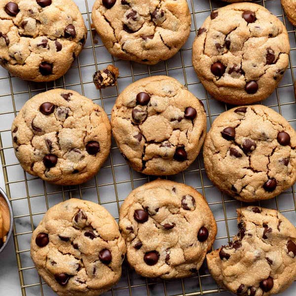 peanut butter chocolate chip cookies on a cooling rack