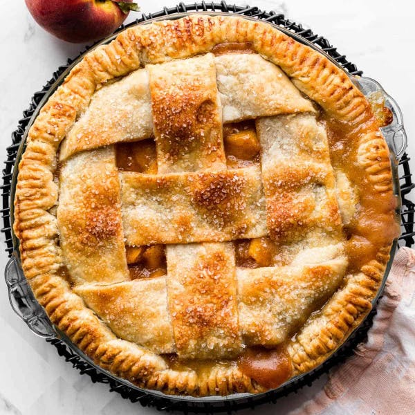 whole peach pie with lattice top