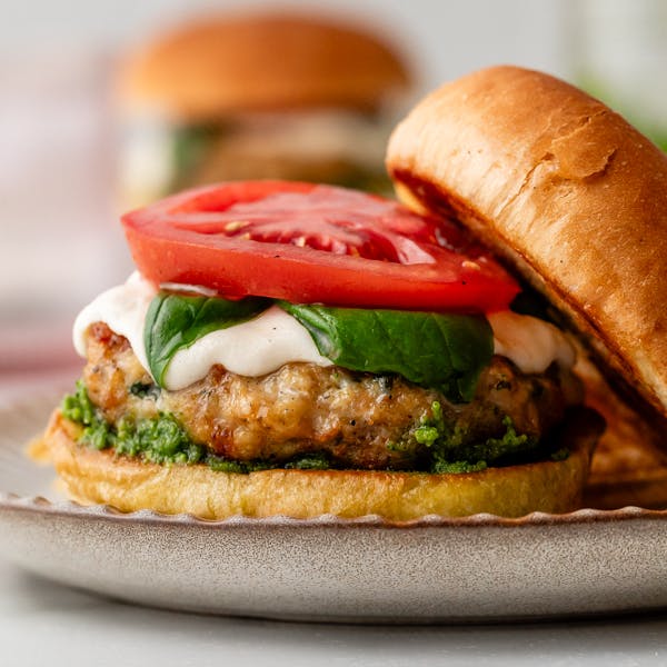 caprese style chicken burger on bun