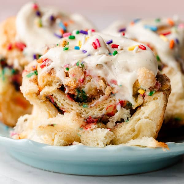 sprinkle cinnamon roll with icing