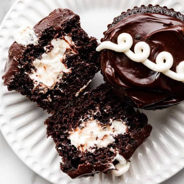 cream filled chocolate cupcakes on plate