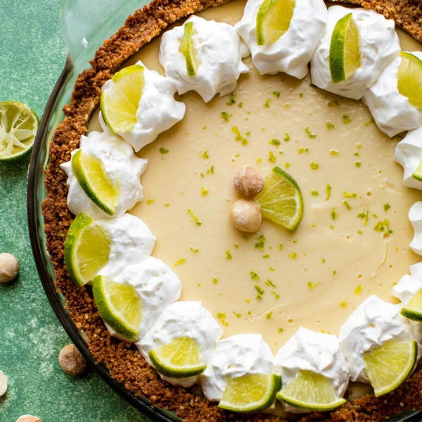 picture of a key lime pie with green background 