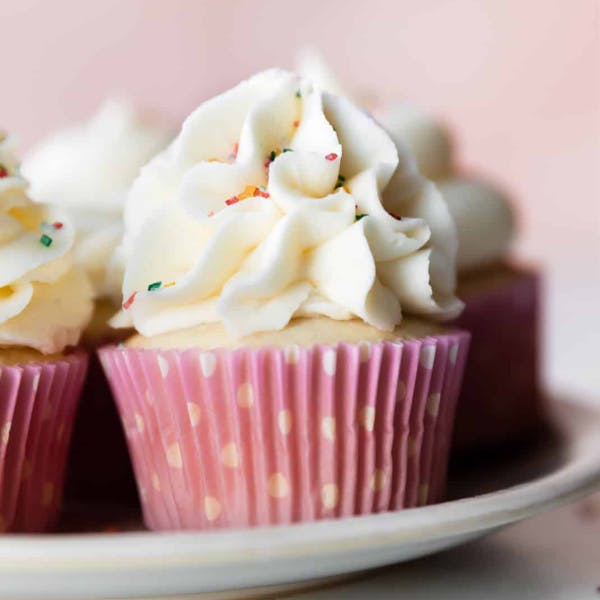 vanilla cupcake with vanilla buttercream and sprinkles