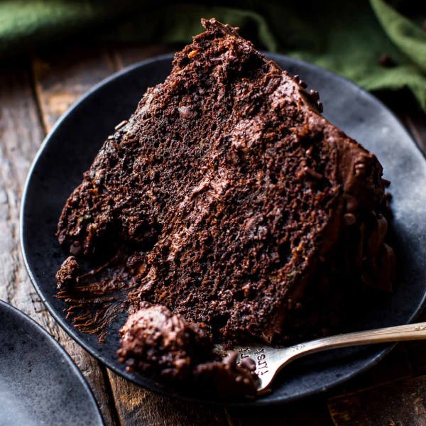 slice of chocolate zucchini cake with chocolate frosting